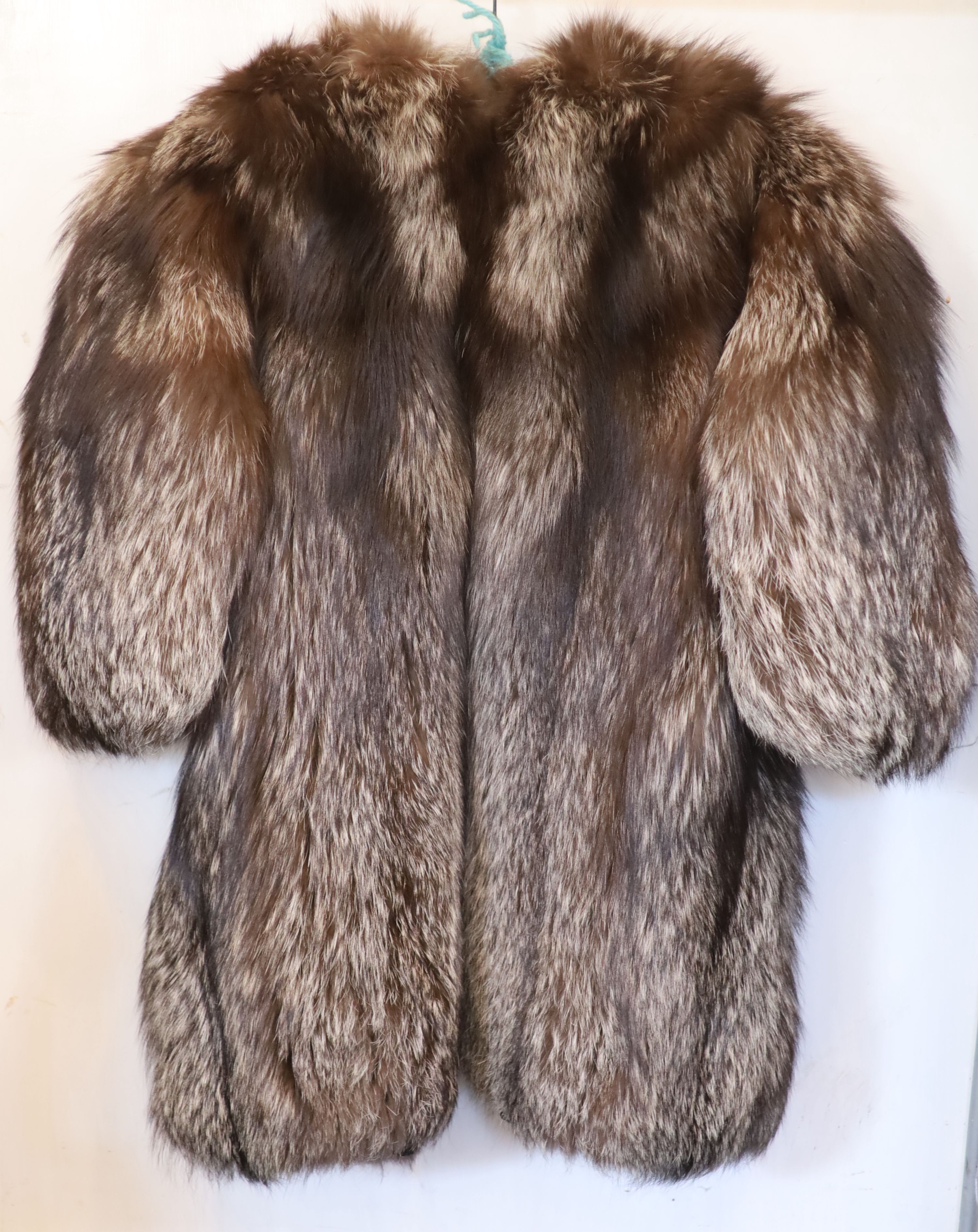 A silver fox three quarter length jacket,